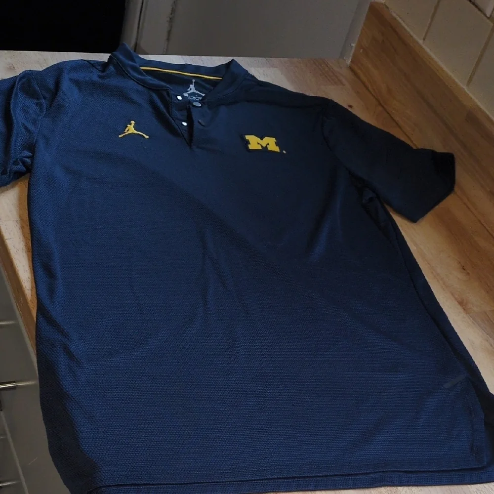 Jordan Men's Dark Blue Polo with Yellow Accents